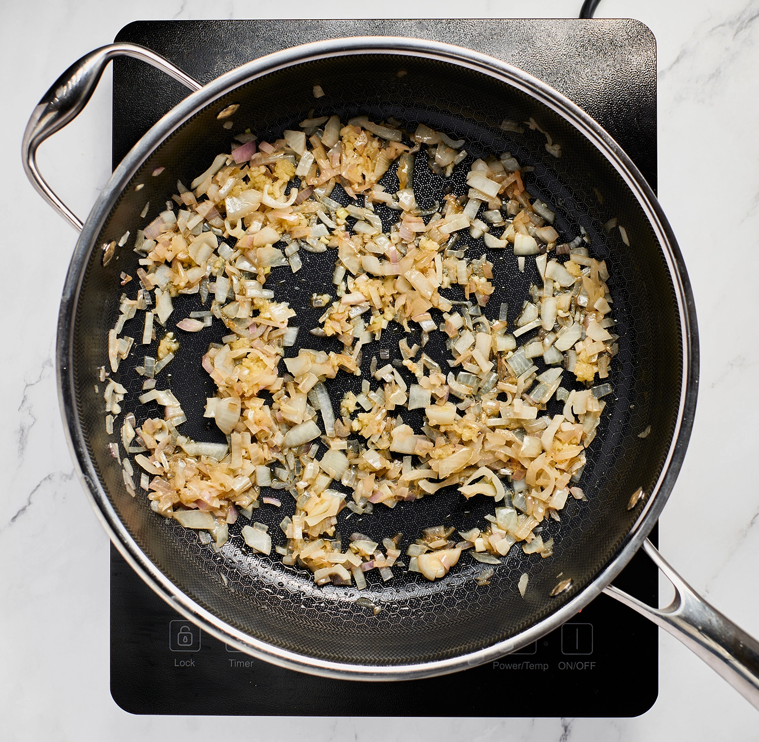 Sea salt, black pepper, garlic powder, onion powder and Italian seasoning to the sautéed aromatics.