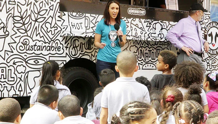 Maryland dairy farmer Katie Dotterer-Pyle speaks to students at the Duke Ellington School in New York City.